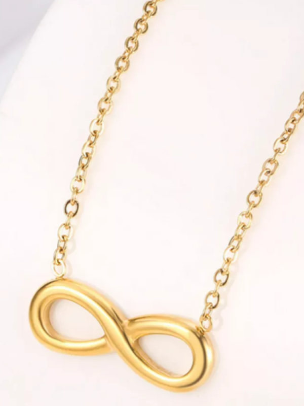 Золотое ожерелье с подвеской бесконечности